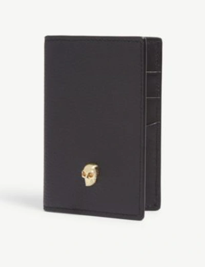Shop Alexander Mcqueen Leather Bi-fold Card Holder In Black/gold
