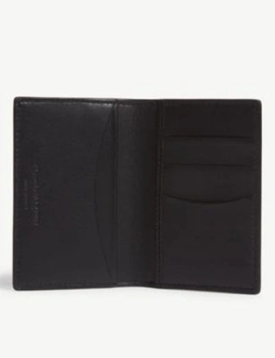 Shop Alexander Mcqueen Leather Bi-fold Card Holder In Black/gold