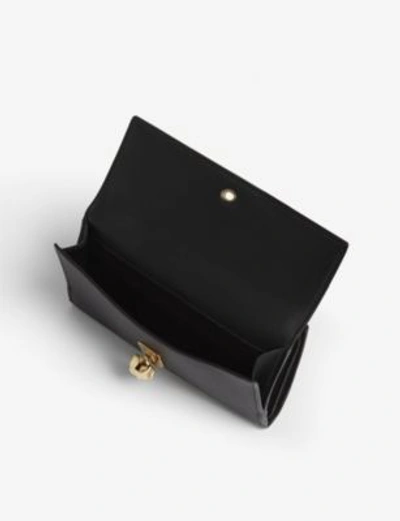 Shop Alexander Mcqueen Skull Continental Wallet In Black