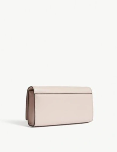 Shop Michael Michael Kors Mott Leather Clutch In Soft Pink