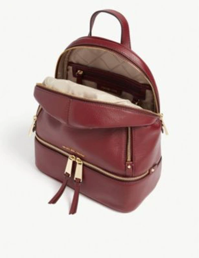 Shop Michael Michael Kors Rhea Medium Leather Backpack In Oxblood