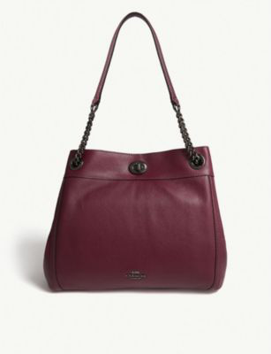 coach edie dark berry