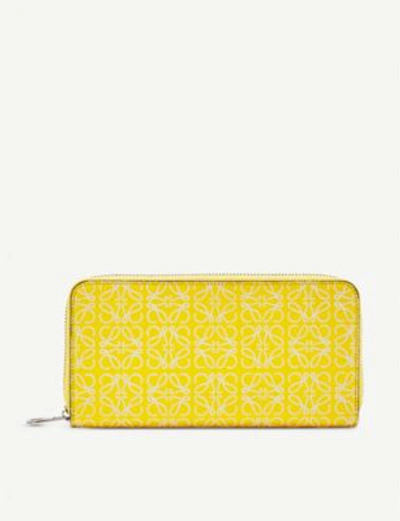 Shop Loewe Anagram Embossed Logo Leather Wallet In Yellow/white