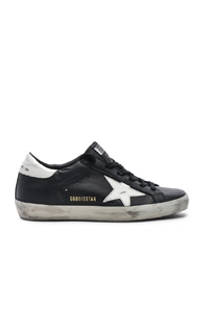 Shop Golden Goose Superstar Sneaker In Black & White