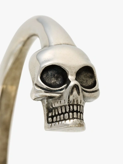 Shop Alexander Mcqueen Skull Torque Bangle In Metallic