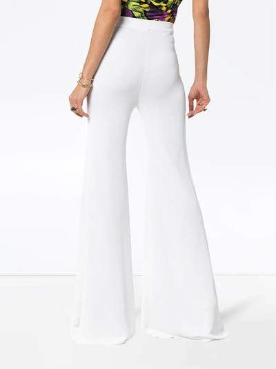 Shop Balmain High Waist Button Detail Flared Trousers In 0fb White