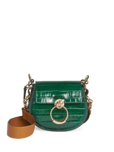 Shop Chloé Tess Croc-embossed Leather Saddle Bag In Green