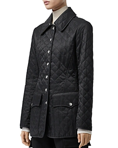 Shop Burberry Mid-length Quilted Coat In Black