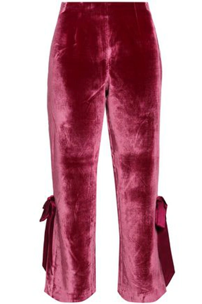 Shop Cinq À Sept Lou Cropped Bow-embellished Velvet Flared Pants In Claret