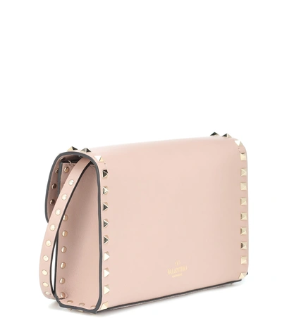 Shop Valentino Garavani Rockstud Medium Leather Shoulder Bag In Pink