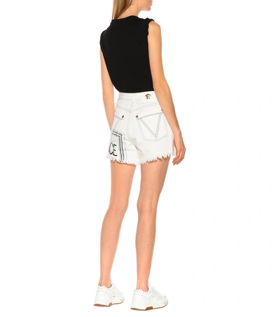 Shop Versace Vintage Logo Denim Shorts In White