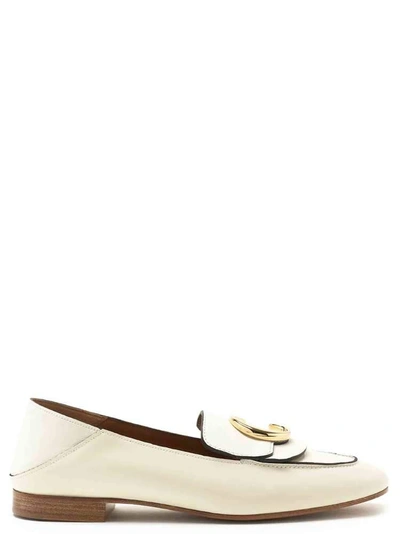 Shop Chloé C Buckle Loafers In White