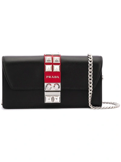 Shop Prada Elektra Studded Clutch - Black