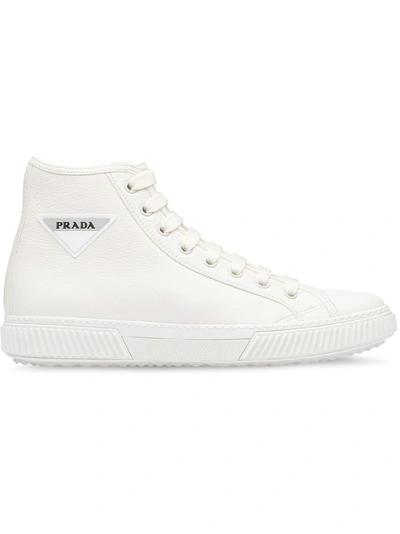 Shop Prada Leather High-top Sneakers - White