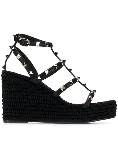 Shop Valentino Garavani Rockstud Wedge Sandals - Black