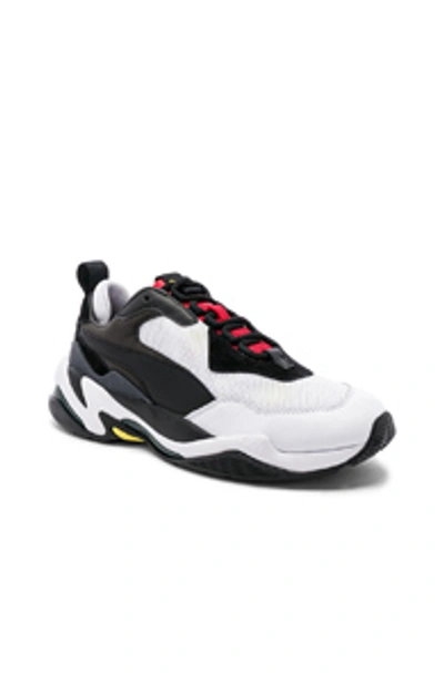 Shop Puma Select Thunder Spectra Sneaker In Black. In  Black & High Risk Red