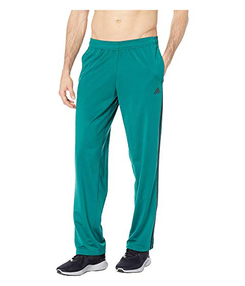 black adidas pants with green stripes