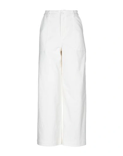 Shop Ganni Pants In White