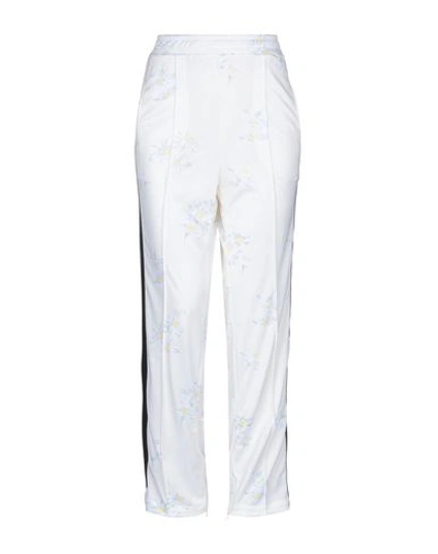 Shop Ganni Casual Pants In Ivory