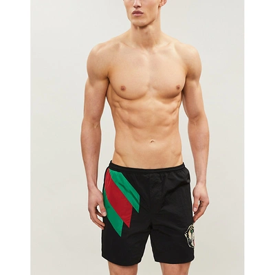 Shop Gucci Tiger Stripe Swim Shorts In Black