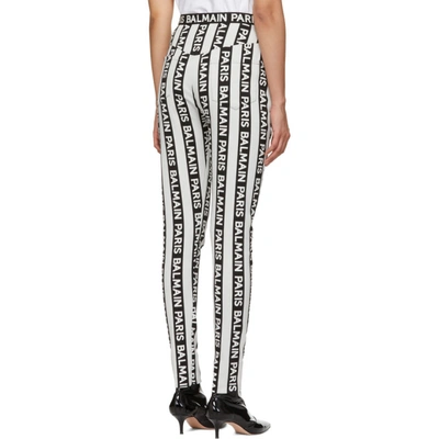 Shop Balmain Black And White Stripe Logo Trousers In Eab Blk/wht