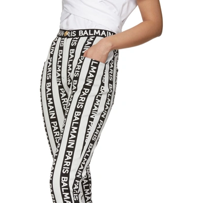 Shop Balmain Black And White Stripe Logo Trousers In Eab Blk/wht