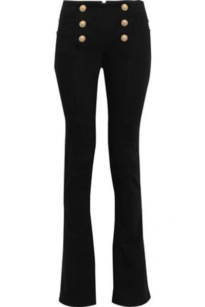 Shop Balmain Button-embellished Mid-rise Flared Jeans In Black