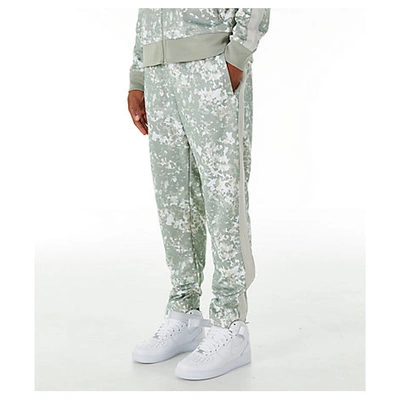 Shop Nike Men's Sportswear Camo Tribute Pants, Grey
