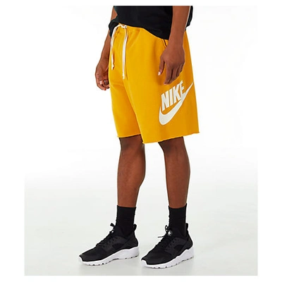 Shop Nike Men's Sportswear Alumni Shorts, Yellow