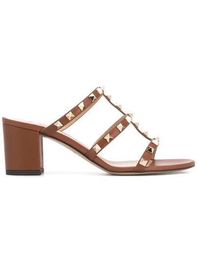 Shop Valentino Garavani Rockstud Mules - Brown