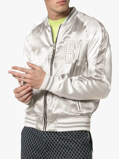 Shop Balmain Logo Embroidered Bomber Jacket In 9aa Metallic