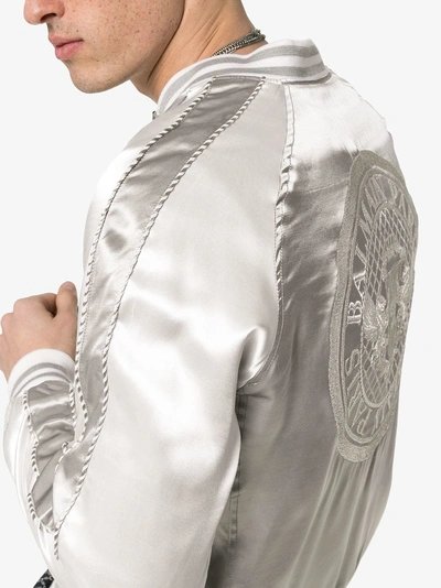 Shop Balmain Logo Embroidered Bomber Jacket In 9aa Metallic