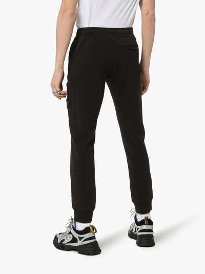 Shop Stone Island Tapered Cotton Sweatpants In Black