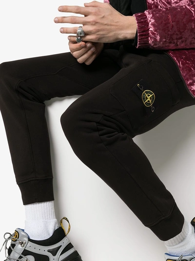 Shop Stone Island Tapered Cotton Sweatpants In Black