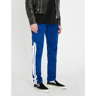 Shop Amiri Stack Track Skinny-fit Stretch-cotton Cargo Trousers In Royal Blue / White