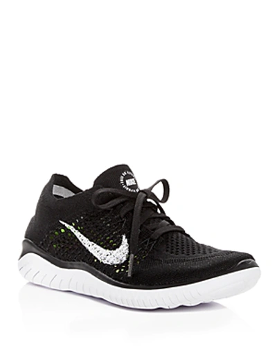 Shop Nike Women's Free Rn Flyknit 2018 Lace Up Sneakers In Black/white