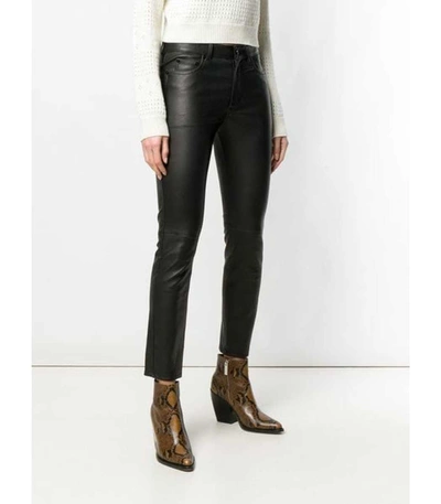Shop Saint Laurent Leather Trousers In Black