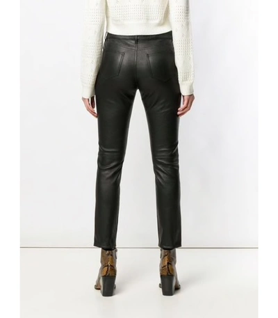 Shop Saint Laurent Leather Trousers In Black