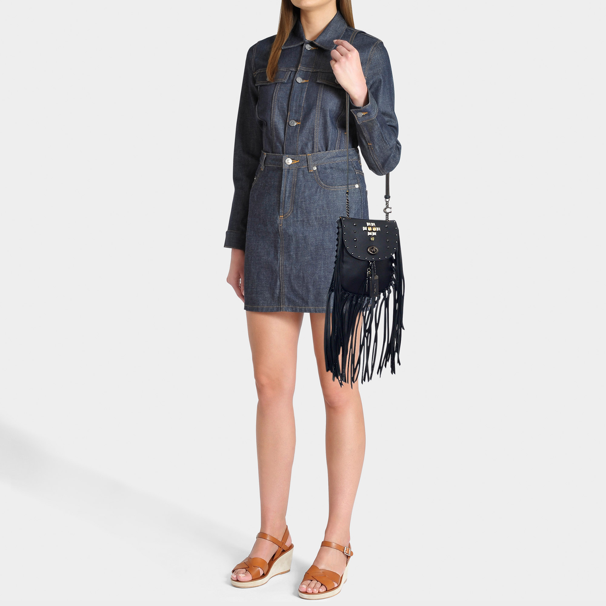 coach fringe saddle bag