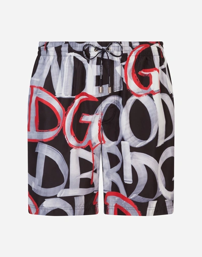 Shop Dolce & Gabbana Printed Mid Swimming Trunks With Pouch Bag In Black