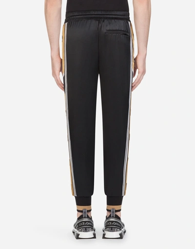 Shop Dolce & Gabbana Satin Jogging Pants With Patch In Black