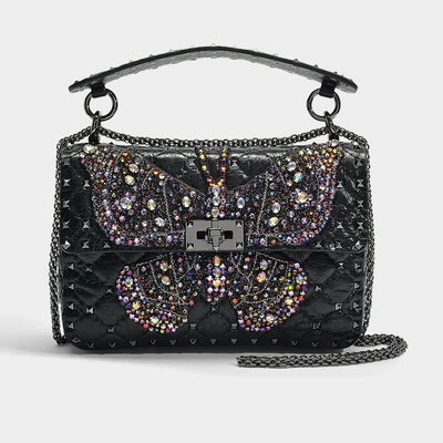 Shop Valentino Garavani | Rockstud Spike It Butterfly Medium Shoulder Bag In Black Lambskin