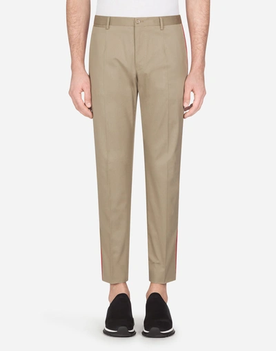 Shop Dolce & Gabbana Trousers In Stretch Cotton With Side Stripes In Beige