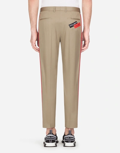 Shop Dolce & Gabbana Trousers In Stretch Cotton With Side Stripes In Beige