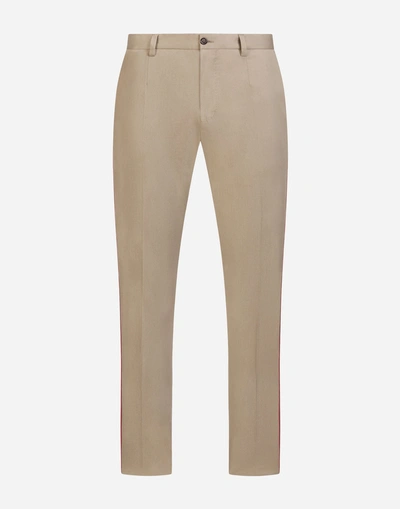 Shop Dolce & Gabbana Trousers In Stretch Cotton With Side Stripes In Beige