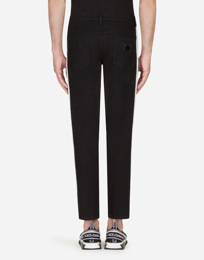 Shop Dolce & Gabbana Skinny Fit Stretch Jeans With Side Bands In Black