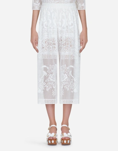 Shop Dolce & Gabbana Lace Pants In White