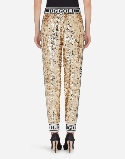 Shop Dolce & Gabbana Sequined Jogging Pants In Gold