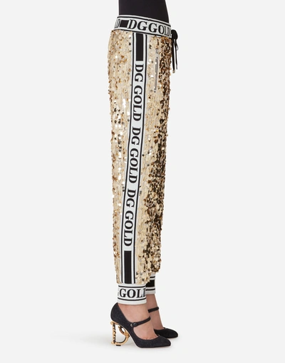 Shop Dolce & Gabbana Sequined Jogging Pants In Gold