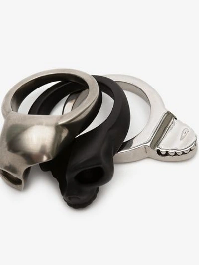 Shop Alexander Mcqueen Divided Skull Ring In Black/silver